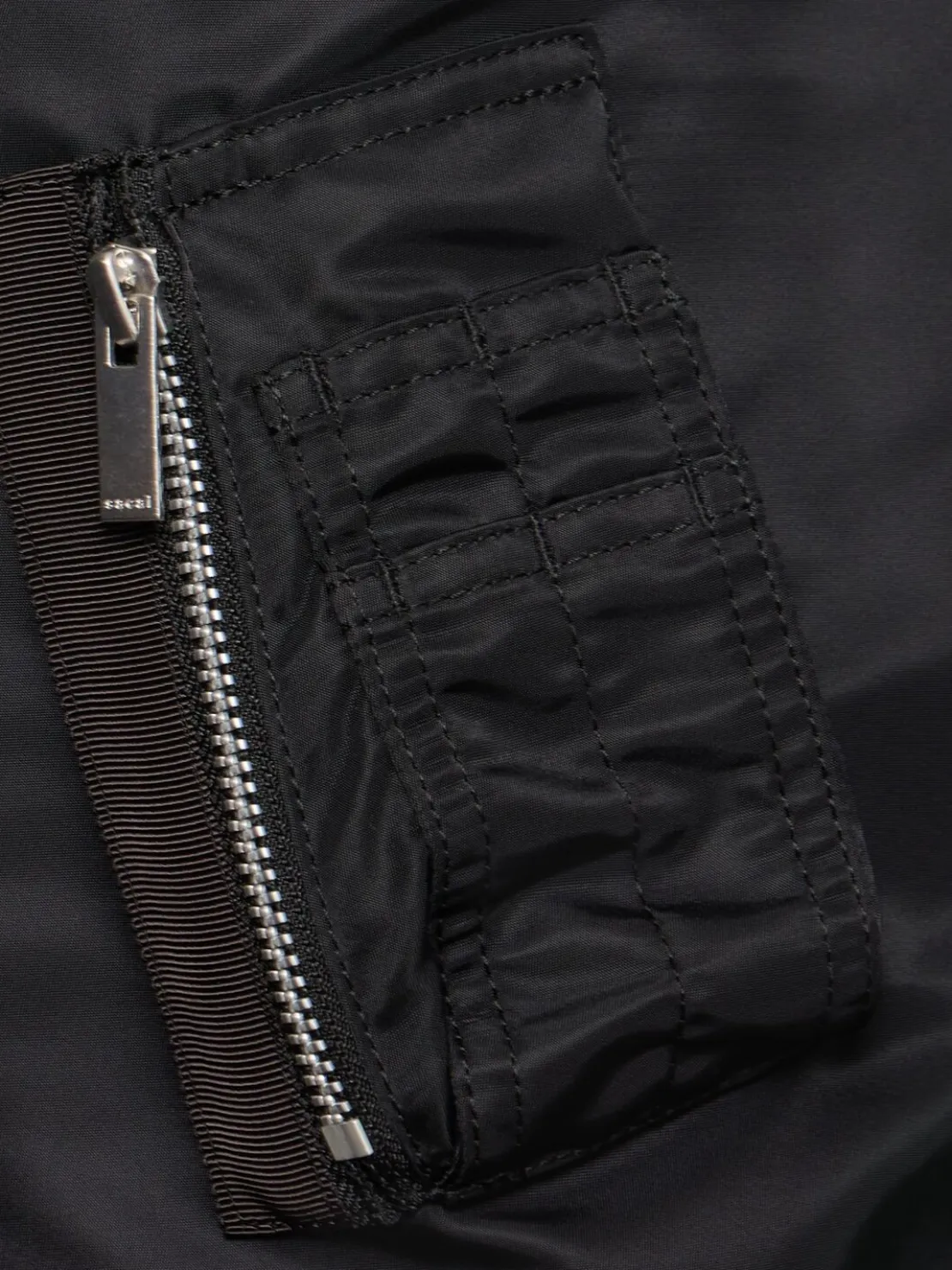 Bomber in nylon con zip