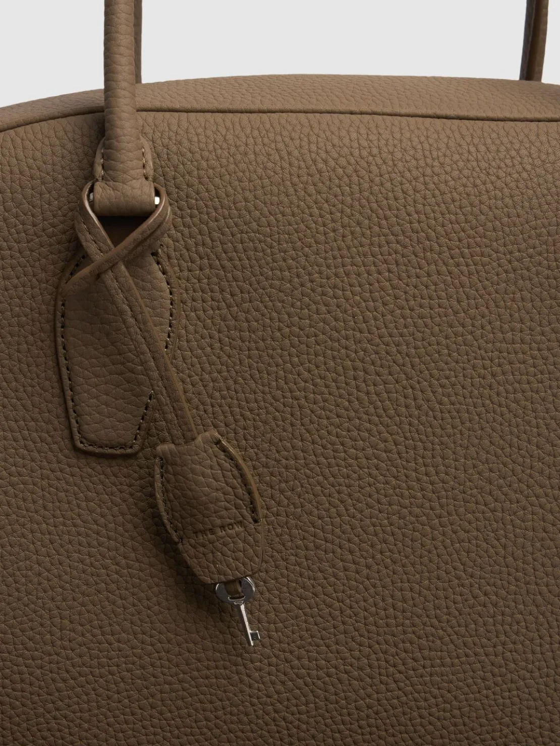 Borsa 15.75 India in pelle martellata