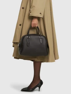 Borsa 15.75 India in pelle martellata