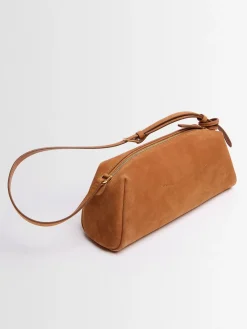 Elongated suede shoulder bag