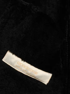 Giacca cerata con shearling