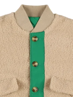 Giacca reversibile in teddy e nylon