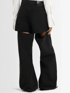 Jeans ampi in tela washed con cutout