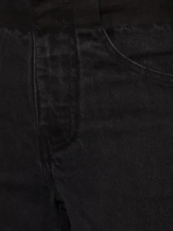 Jeans larghi vita alta in denim destrutturato