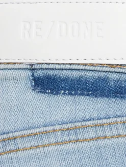 Jeans larghi vita media