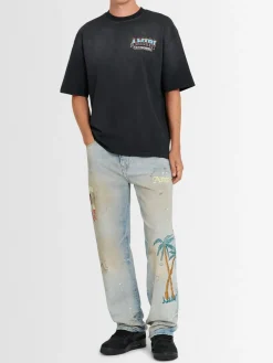 Jeans ricamati Sinners
