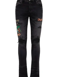 Jeans skinny ricamati Sinners