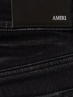Jeans skinny ricamati Sinners