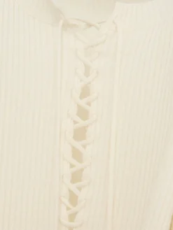 Maglia cropped Fanja con laccini