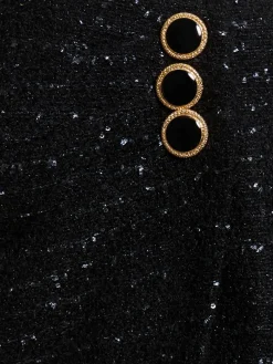 Minigonna in tweed con paillettes
