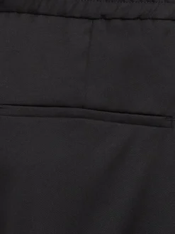 Pantaloni dritti in twill di lana con pinces