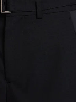 Pantaloni larghi in gabardina con cintura