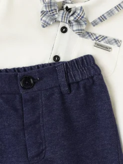 Polo in cotone piquet e pantaloni chino