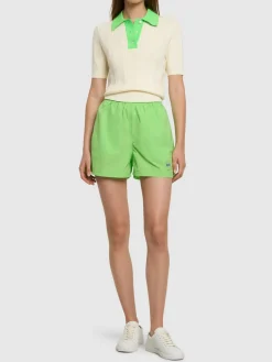 Shorts in nylon techno con logo
