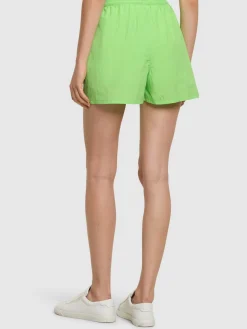 Shorts in nylon techno con logo