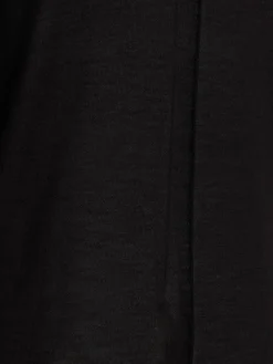 Top collo alto Level in maglia di lana