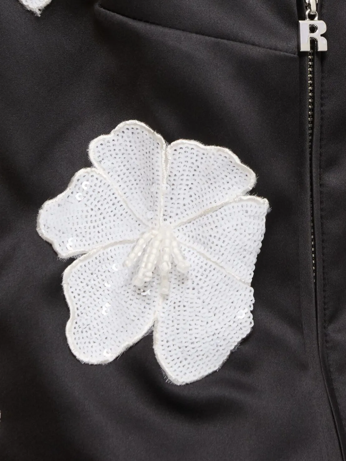 Top in raso con fiori