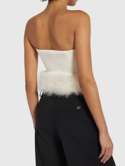 Top senza maniche con piume