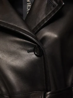 Trench in pelle e shearling